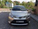 Toyota Vios E 2014 - Gia đình cần bán Toyota Vios sản xuất 2014, số sàn, màu vàng cát, chính chủ