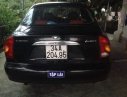 Daewoo Lanos   2005 - Cần bán gấp Daewoo Lanos đời 2005, màu đen