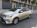 Toyota Vios E 2014 - Cần bán gấp Toyota Vios sản xuất 2014, số sàn, màu vàng cát. Chính chủ gia đình đang sử dụng