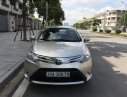 Toyota Vios E 2014 - Cần bán gấp Toyota Vios sản xuất 2014, số sàn, màu vàng cát. Chính chủ gia đình đang sử dụng