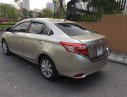 Toyota Vios E 2014 - Gia đình cần bán Toyota Vios sản xuất 2014, số sàn, màu vàng cát, chính chủ