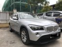 BMW X1 2012 - Cần bán BMW X1 sản xuất 2012, màu bạc, nhập khẩu, 586 triệu