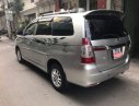 Toyota Innova V 2014 - Cần bán lại xe Toyota Innova V sản xuất năm 2014, màu bạc còn mới