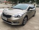 Kia K3 2015 - Chính chủ bán xe Kia K3 đời 2015, màu vàng cát