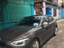 BMW 1 Series 116i 2014 - Bán BMW 1 Series 116i năm sản xuất 2014, màu nâu, xe nhập, giá 850tr