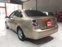 Daewoo Lacetti EX 2011 - Cần bán lại xe Daewoo Lacetti EX đời 2011, màu vàng cát