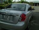 Chevrolet Lacetti 1.6 2011 - Cần bán xe Chevrolet Lacetti 1.6 đời 2011, màu bạc như mới