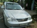 Chevrolet Lacetti 1.6 2011 - Cần bán xe Chevrolet Lacetti 1.6 đời 2011, màu bạc như mới