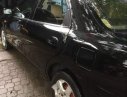 Mazda 323 1999 - Cần bán Mazda 323 đời 1999, màu đen, 83 triệu