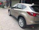 Mazda CX 5 2.0 AT 2014 - Bán Mazda CX 5 2.0AT năm sản xuất 2014, màu vàng cát