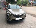 Mazda CX 5 2.0 AT 2014 - Bán Mazda CX 5 2.0AT năm sản xuất 2014, màu vàng cát