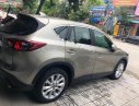 Mazda CX 5 2.0 AT 2014 - Bán Mazda CX 5 2.0AT năm sản xuất 2014, màu vàng cát