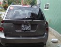 Kia Carens LX 1.6 MT 2010 - Cần bán Kia Carens LX 1.6 MT đời 2010, màu xám