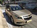 Chevrolet Cruze LS 2013 - Bán nhanh Chevrolet Cruze LS 2013 số sàn vàng cát chất zin