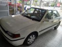 Mazda 323 1.6 MT 1995 - Cần bán Mazda 323 1.6 MT năm sản xuất 1995, màu trắng