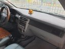 Daewoo Lacetti EX 1.6 MT 2005 - Cần bán xe Daewoo Lacetti EX 1.6 MT đời 2005, màu trắng