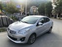 Mitsubishi Attrage 1.2 MT 2014 - Bán xe Mitsubishi Attrage 1.2 MT đời 2014, màu bạc, nhập khẩu
