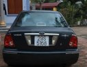 Ford Laser   1.8 MT  2002 - Cần bán xe Ford Laser 1.8 MT đời 2002, màu đen 