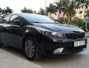 Kia Cerato  MT 2016 - Cần bán xe Kia Cerato MT năm sản xuất 2016, màu đen như mới