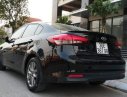 Kia Cerato  MT 2016 - Cần bán xe Kia Cerato MT năm sản xuất 2016, màu đen như mới