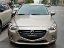 Mazda 2 2015 - Bán Mazda 2 năm sản xuất 2015, màu vàng