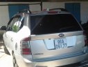 Kia Carens Lx 2010 - Bán Kia Carens Lx đời 2010, màu bạc đã đi 90300km, giá 295tr