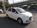 Hyundai Grand i10 1.2 MT 2018 - Cần bán lại xe Hyundai Grand i10 1.2 MT đời 2018, màu trắng xe gia đình, giá tốt