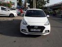 Hyundai Grand i10 1.2 MT 2018 - Cần bán lại xe Hyundai Grand i10 1.2 MT đời 2018, màu trắng xe gia đình, giá tốt