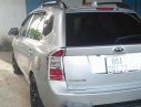 Kia Carens Lx 2010 - Bán Kia Carens Lx đời 2010, màu bạc đã đi 90300km, giá 295tr