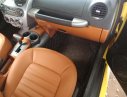 Volkswagen New Beetle    2003 - Xe Volkswagen New Beetle mui trần, đăng ký lần đầu 2003, màu vàng xe nhập