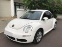 Volkswagen New Beetle 1.6 AT 2009 - Cần bán lại xe Volkswagen New Beetle 1.6 AT đời 2009, màu trắng, nhập khẩu nguyên chiếc