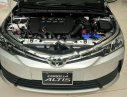 Toyota Corolla altis 1.8E AT 2018 - Cần bán xe Toyota Corolla altis 1.8E AT đời 2018, màu bạc giá cạnh tranh