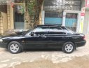 Mazda 626 1997 - Cần bán xe Mazda 626 1997, màu đen, nhập khẩu nguyên chiếc 