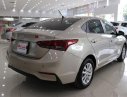 Hyundai Acent 1.4MT 2018 - Cần bán xe Hyundai Acent 1.4MT đời 2018 ghi vàng