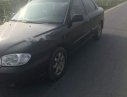 Kia Spectra   2005 - Cần bán lại xe Kia Spectra đời 2005, màu đen