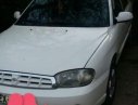 Kia Spectra 2005 - Cần bán gấp Kia Spectra đời 2005, màu trắng như mới