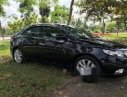 Kia Forte MT 2011 - Cần bán gấp Kia Forte MT năm 2011, màu đen chính chủ, giá 360tr