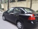 Daewoo Gentra  MT 2010 - Cần bán gấp Daewoo Gentra MT sản xuất năm 2010, màu đen, nội thất nguyên nỉ