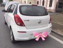 Hyundai i20 2014 - Bán xe Hyundai I20 AT sx 2014, màu trắng, xe nhập, giá chỉ 415 triệu