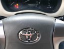 Toyota Innova 2014 - Cần bán Toyota Innova đời 2014, màu bạc xe gia đình