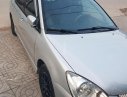 Mitsubishi Lancer 2004 - Cần bán Mitsubishi Lancer AT đời 2004, màu xám (ghi) còn mới, giá 228 triệu