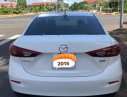 Mazda 3 2.0 2015 - Cần bán gấp Mazda 3 2.0 đời 2015, màu trắng như mới