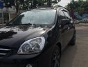 Kia Carens 2.0  2010 - Bán ô tô Kia Carens 2.0 đời 2010, màu đen xe gia đình