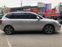 Kia Carens EX 2011 - Nhà cần bán Kia Caren 2011, màu bạc