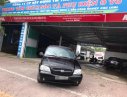 Kia Carnival GS 2006 - Cần bán xe Kia Carnival năm 2006 màu đen, giá chỉ 220 triệu, nhập khẩu