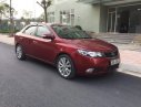 Kia Cerato  AT 2010 - Bán chiếc xe Kia Cerato số tự động, đăng ký năm 2011, màu đỏ, bản đầy đủ nhất