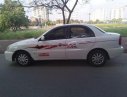 Daewoo Lanos SX 2004 - Cần bán gấp Daewoo Lanos SX năm sản xuất 2004, màu trắng, giá 85tr