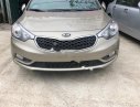 Kia K3 2015 - Bán Kia K3 sản xuất 2015, màu vàng số sàn giá cạnh tranh