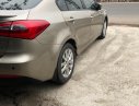 Kia K3 2015 - Bán Kia K3 sản xuất 2015, màu vàng số sàn giá cạnh tranh