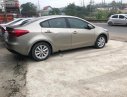 Kia K3 2015 - Bán Kia K3 sản xuất 2015, màu vàng số sàn giá cạnh tranh